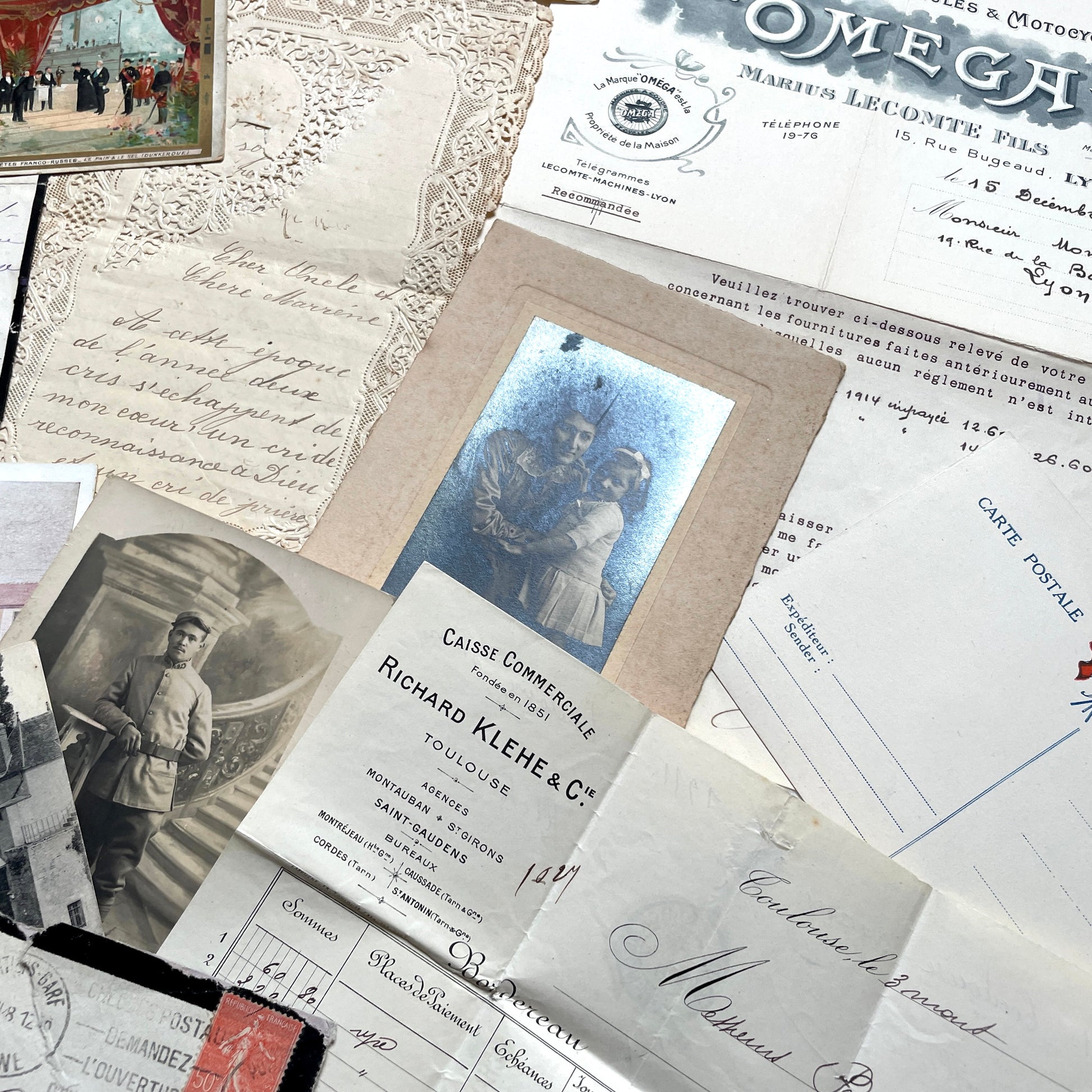 1910s French documents lot with vintage postcards, handwritten letters, business papers, and historical photos.