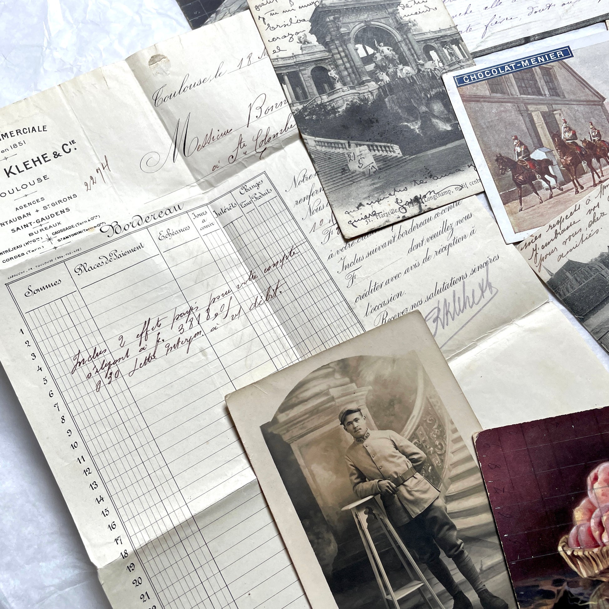 1910s French documents lot with vintage postcards, handwritten letters, business papers, and historical photos.
