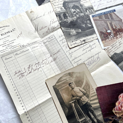 1910s French documents lot with vintage postcards, handwritten letters, business papers, and historical photos.