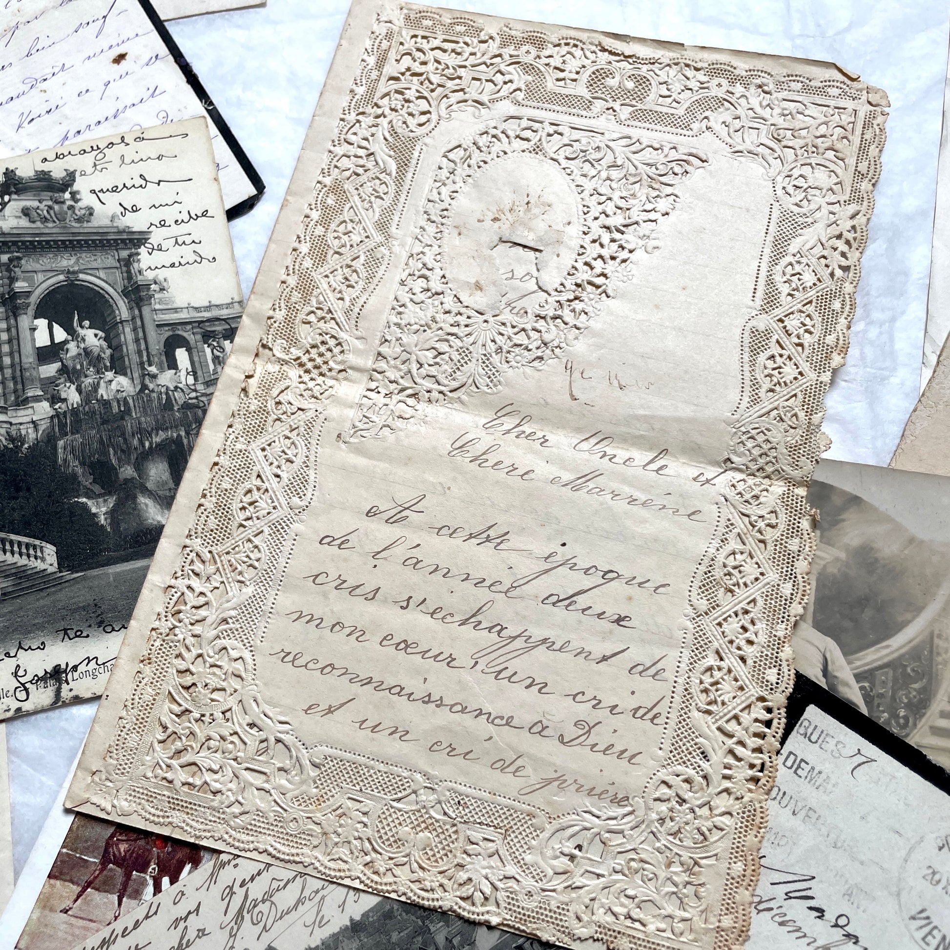 1910s French documents lot with vintage postcards, handwritten letters, business papers, and historical photos.