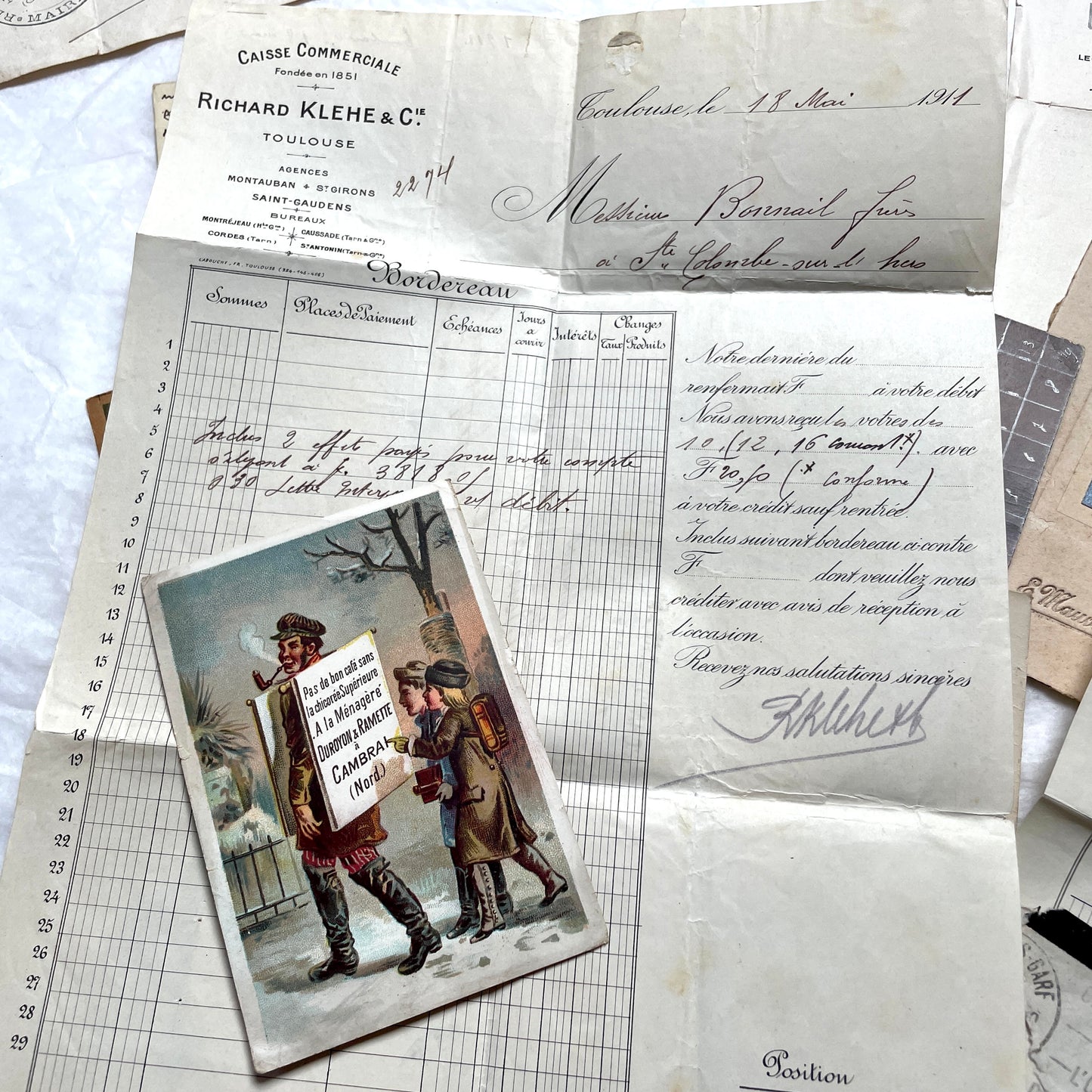 1910s French documents lot with vintage postcards, handwritten letters, business papers, and historical photos.