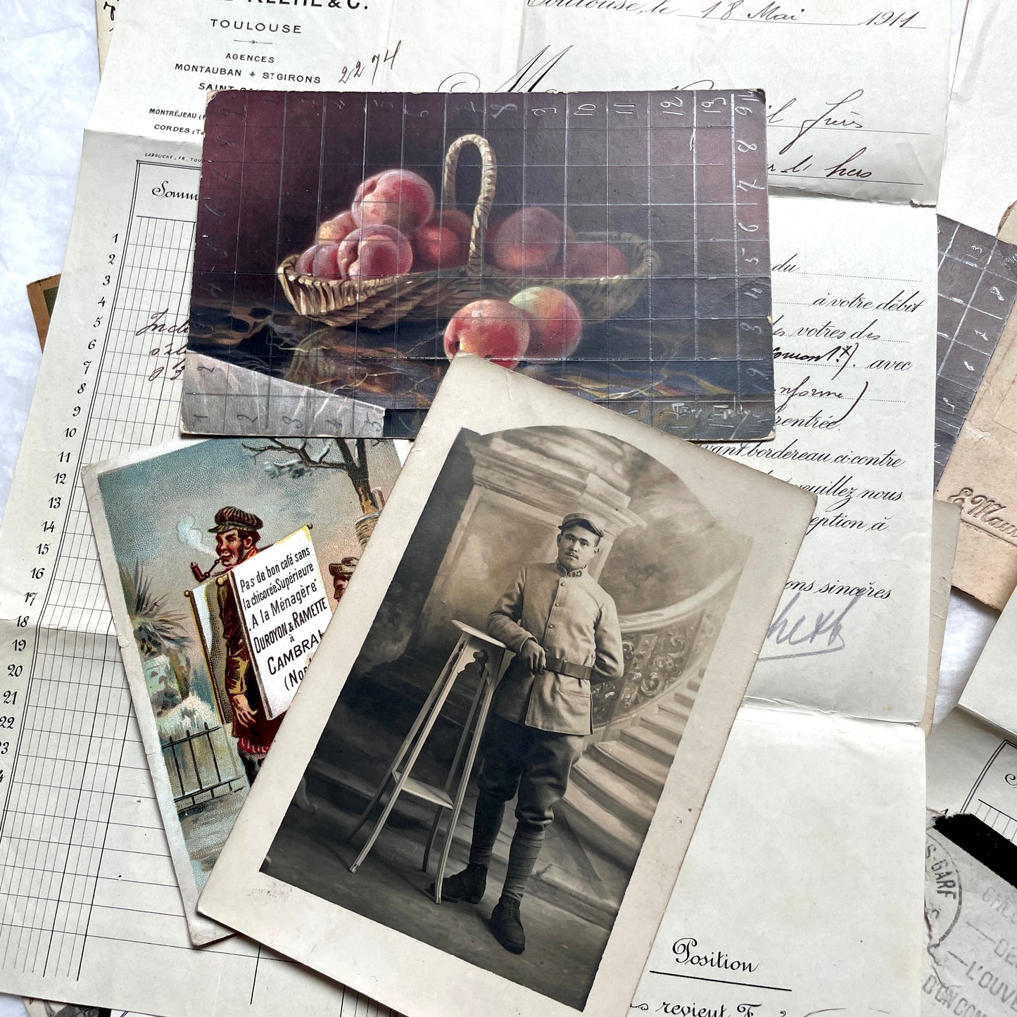 1910s French documents lot with vintage postcards, handwritten letters, business papers, and historical photos.
