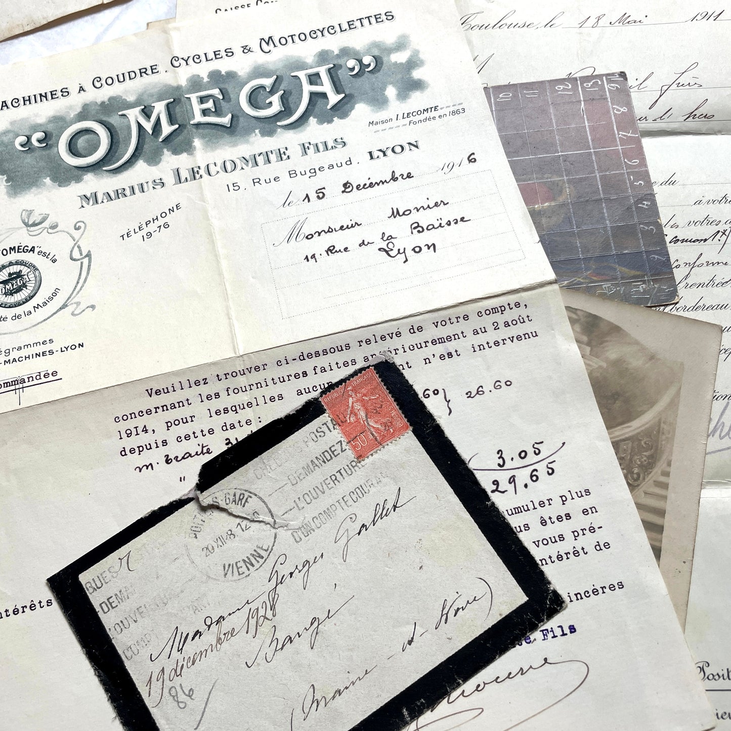 1910s French documents lot with vintage postcards, handwritten letters, business papers, and historical photos.