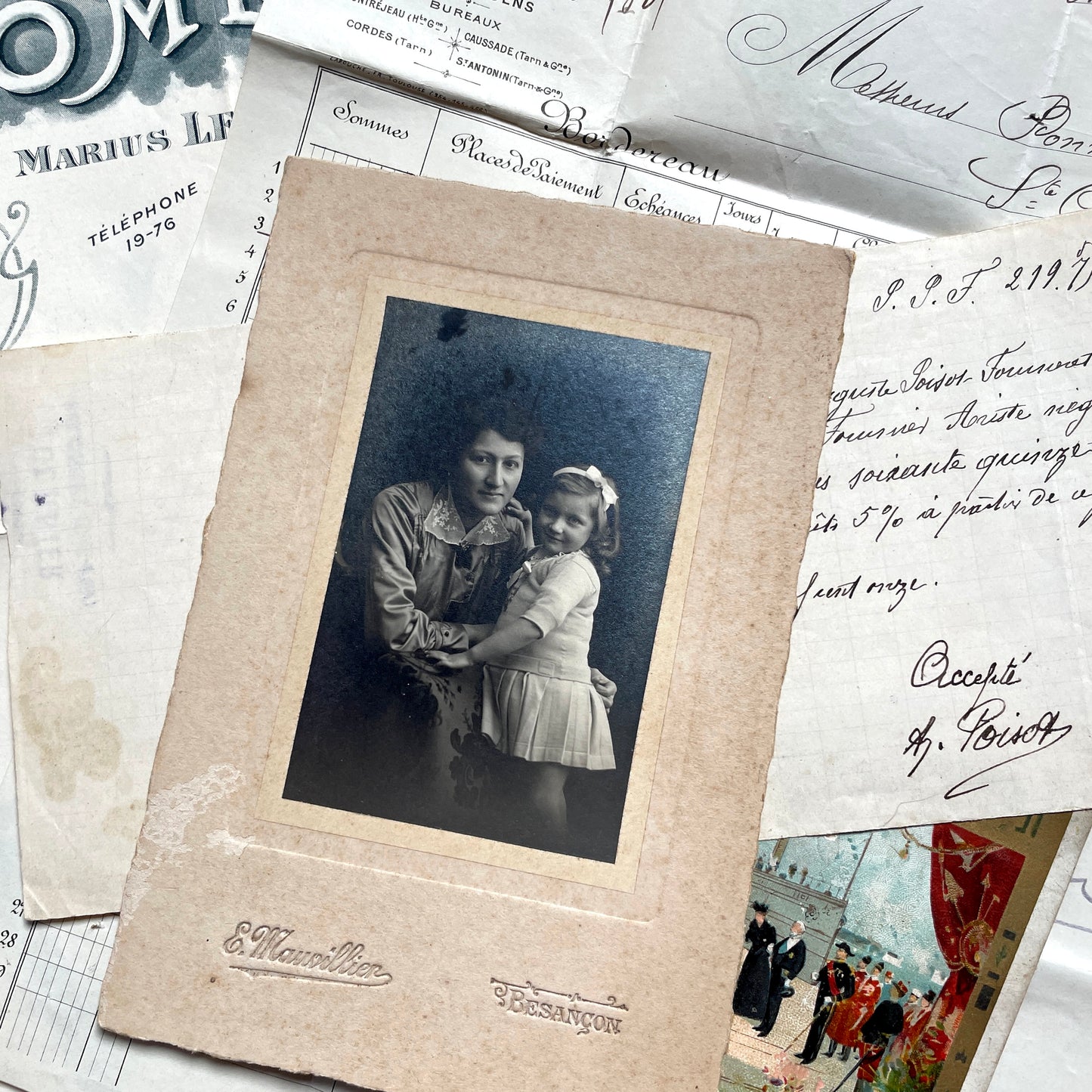 1910s French documents lot with vintage postcards, handwritten letters, business papers, and historical photos.