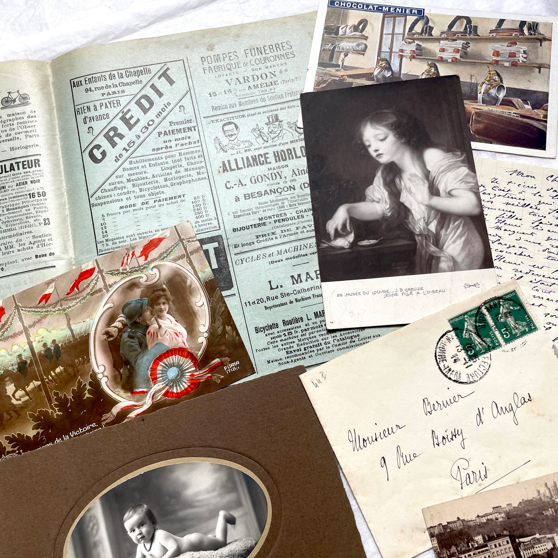 1910s French ephemera lot featuring vintage letters, postcards, bank documents, and photographs from France.