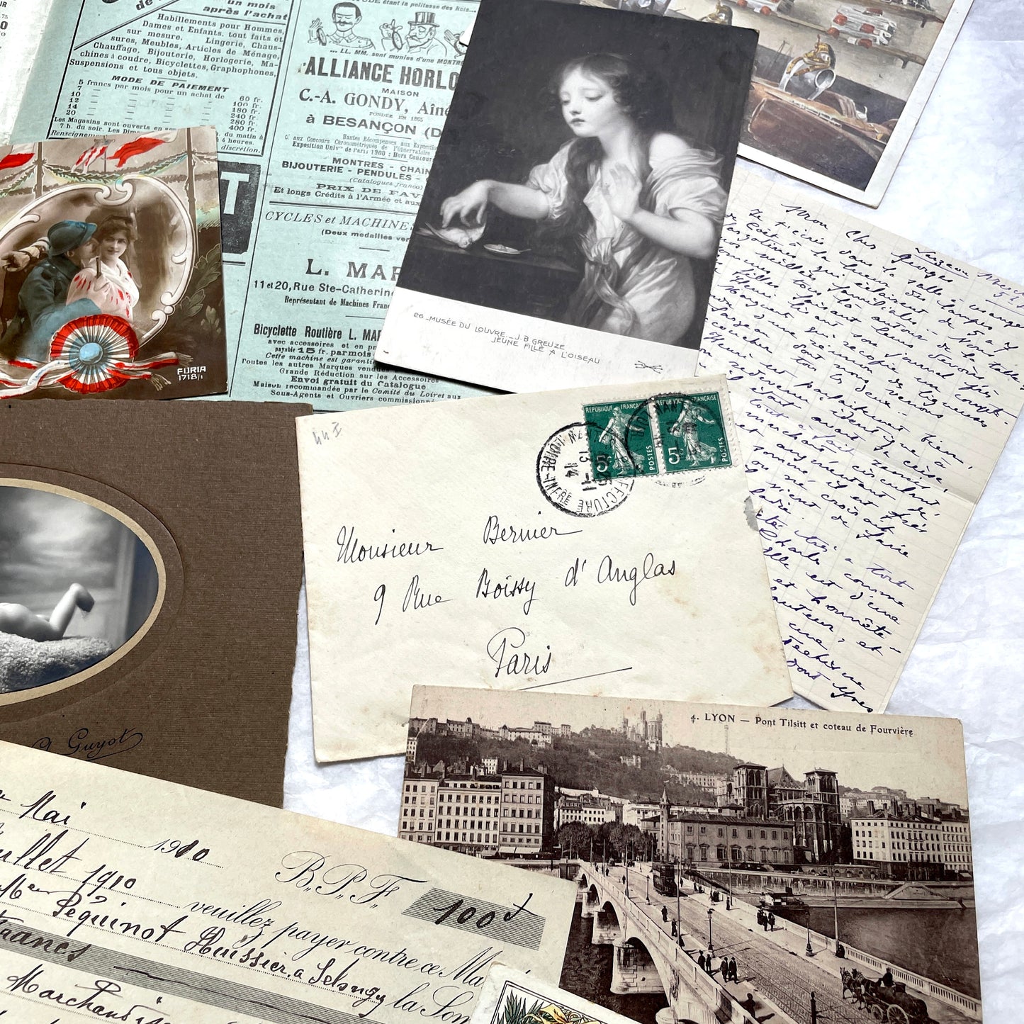 1910s French ephemera lot featuring vintage letters, postcards, bank documents, and photographs from France.