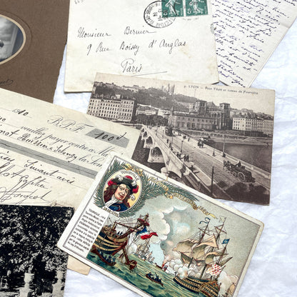 1910s French ephemera lot featuring vintage letters, postcards, bank documents, and photographs from France.