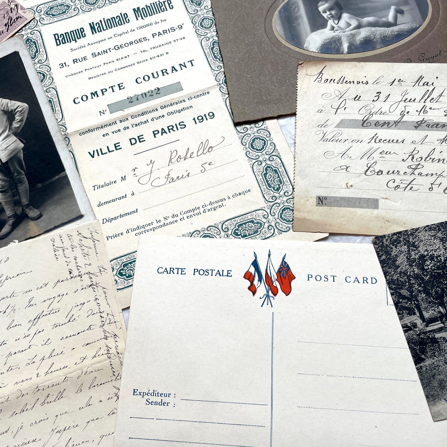 1910s French ephemera lot featuring vintage letters, postcards, bank documents, and photographs from France.