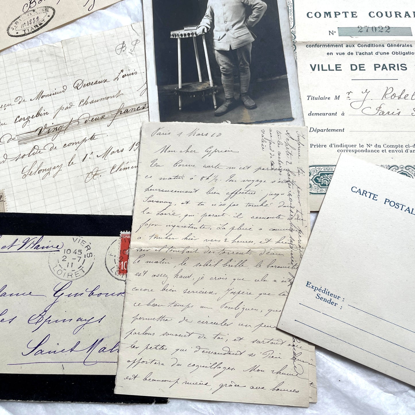 1910s French ephemera lot featuring vintage letters, postcards, bank documents, and photographs from France.