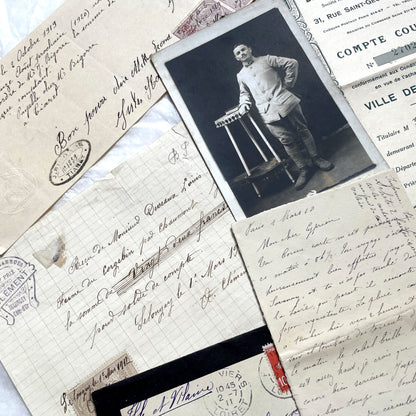 1910s French ephemera lot featuring vintage letters, postcards, bank documents, and photographs from France.