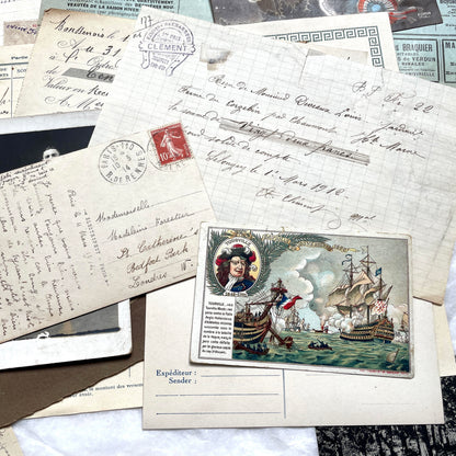 1910s French ephemera lot featuring vintage letters, postcards, bank documents, and photographs from France.