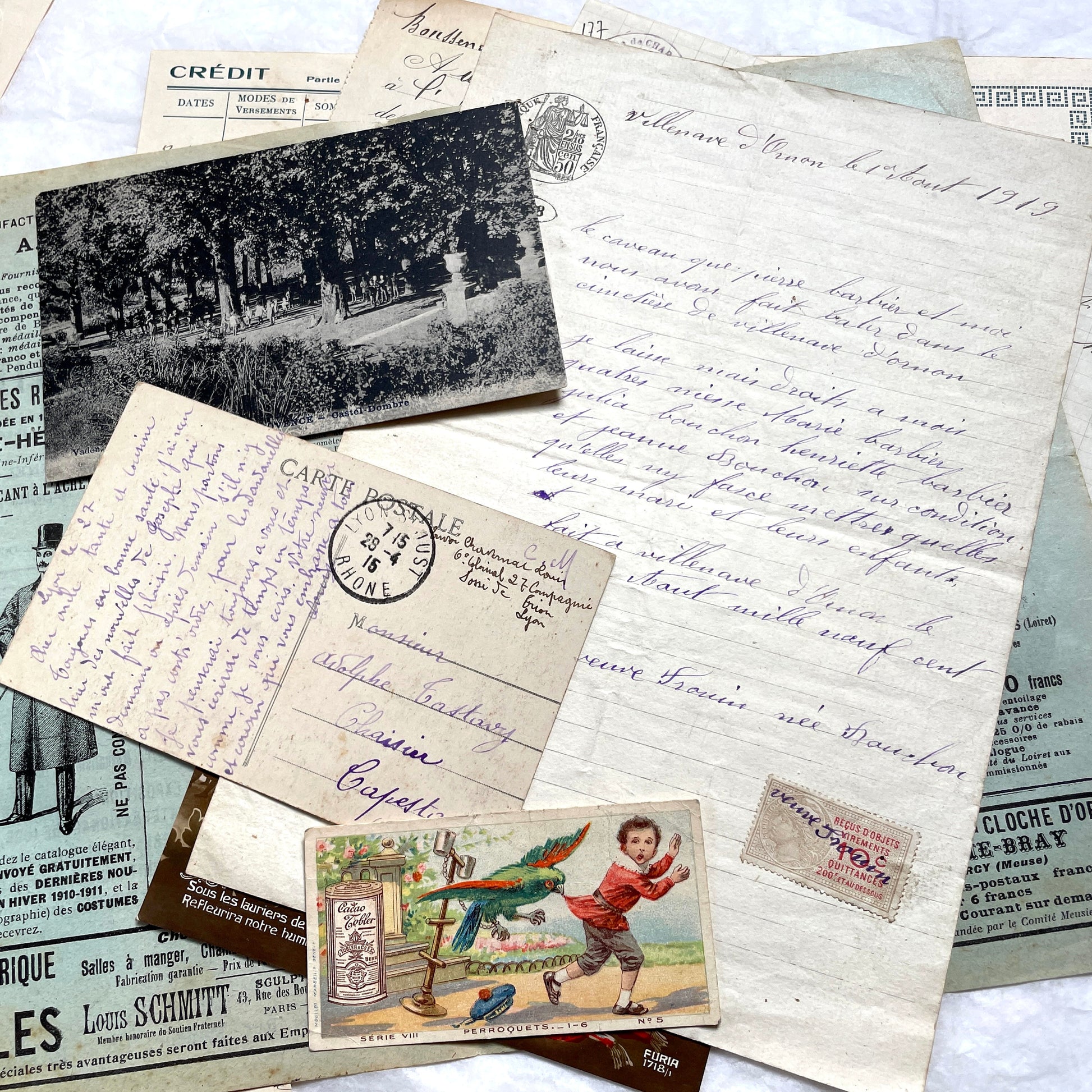 1910s French ephemera lot featuring vintage letters, postcards, bank documents, and photographs from France.