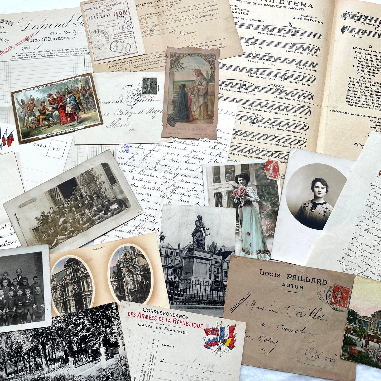Mixed French Ephemera Lot, 1910s. Vintage postcards, handwritten letters, photos, and historical French documents.