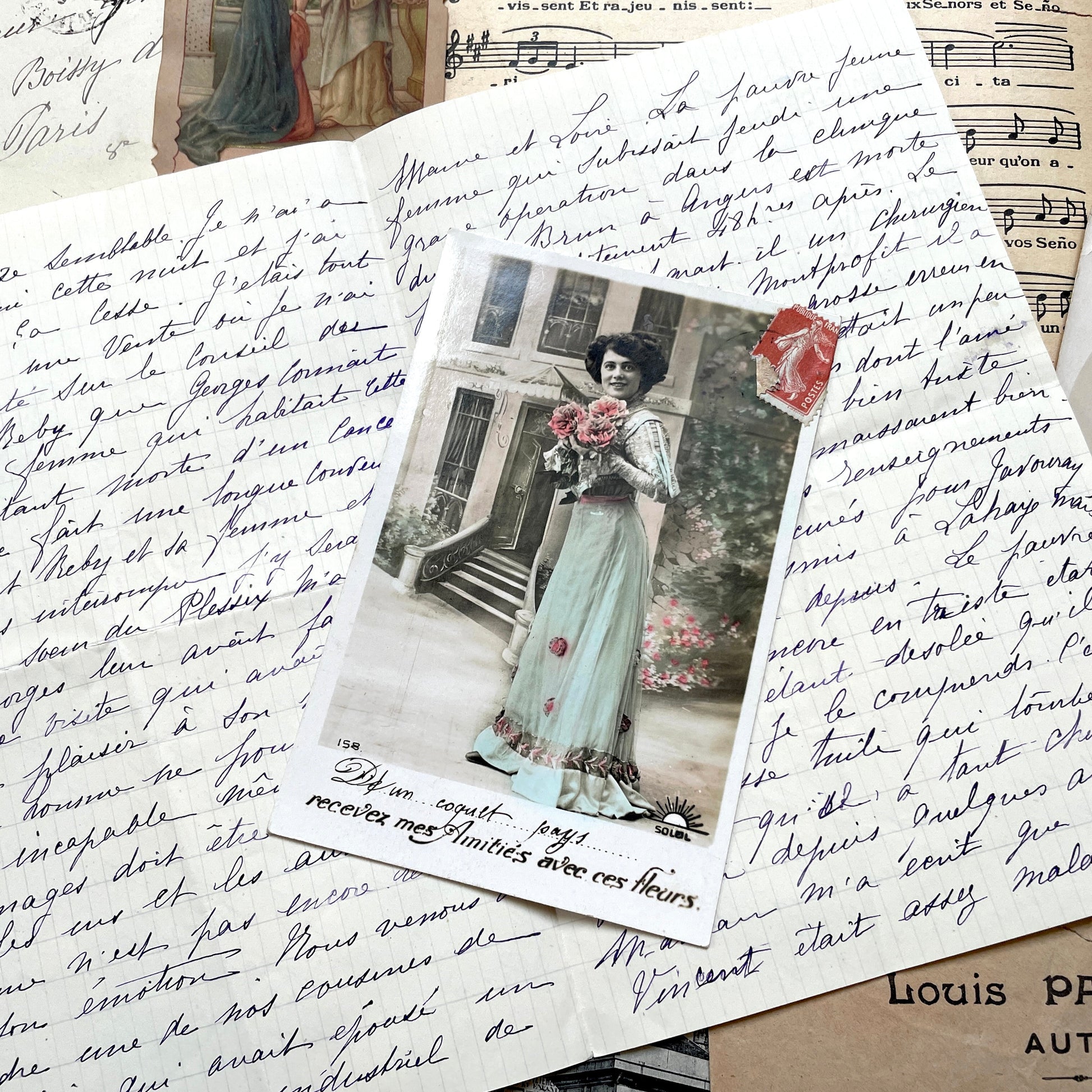 Mixed French Ephemera Lot, 1910s. Vintage postcards, handwritten letters, photos, and historical French documents.