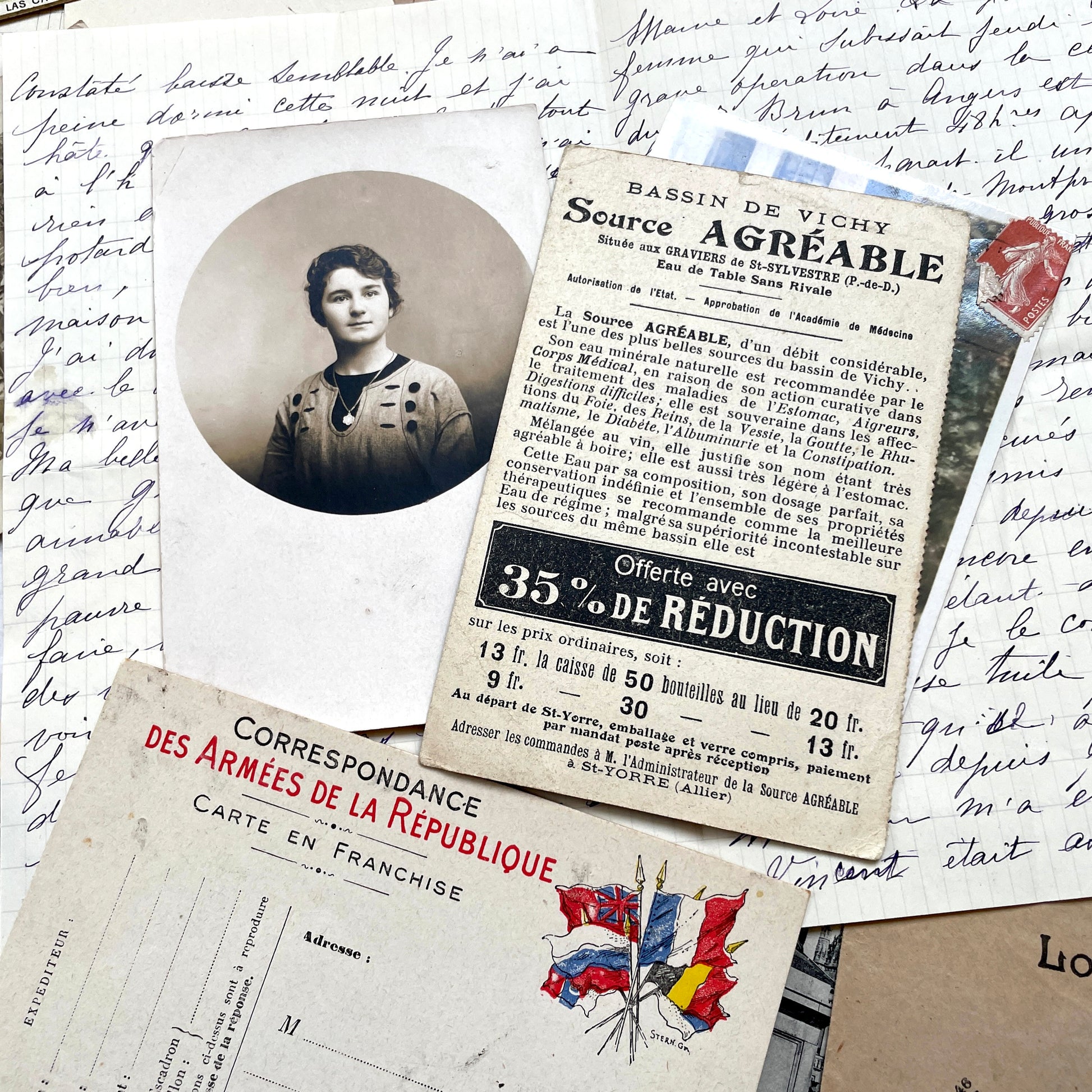 Mixed French Ephemera Lot, 1910s. Vintage postcards, handwritten letters, photos, and historical French documents.
