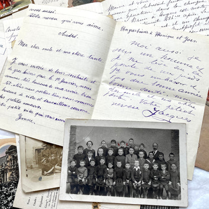 Mixed French Ephemera Lot, 1910s. Vintage postcards, handwritten letters, photos, and historical French documents.