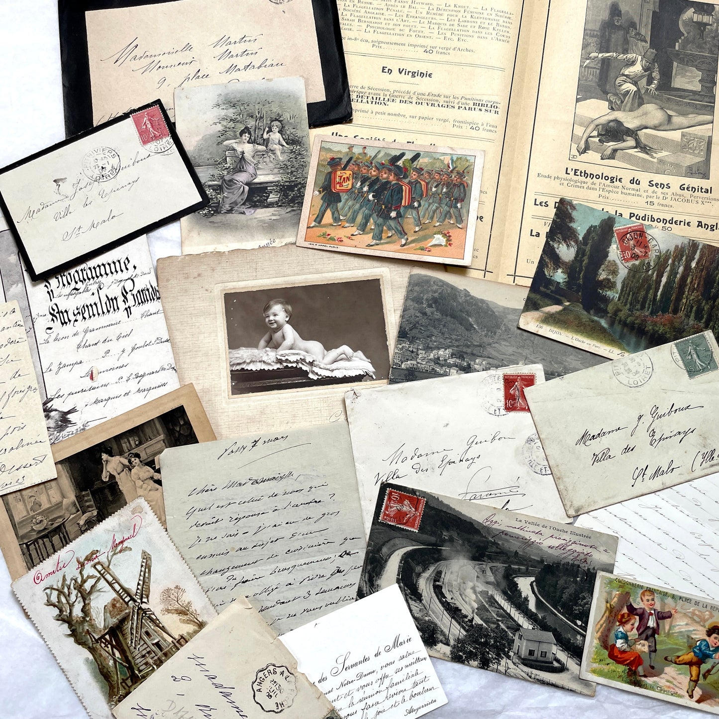 1910s Vintage French Ephemera Lot featuring handwritten letters, postcards, baby photo, and old documents.