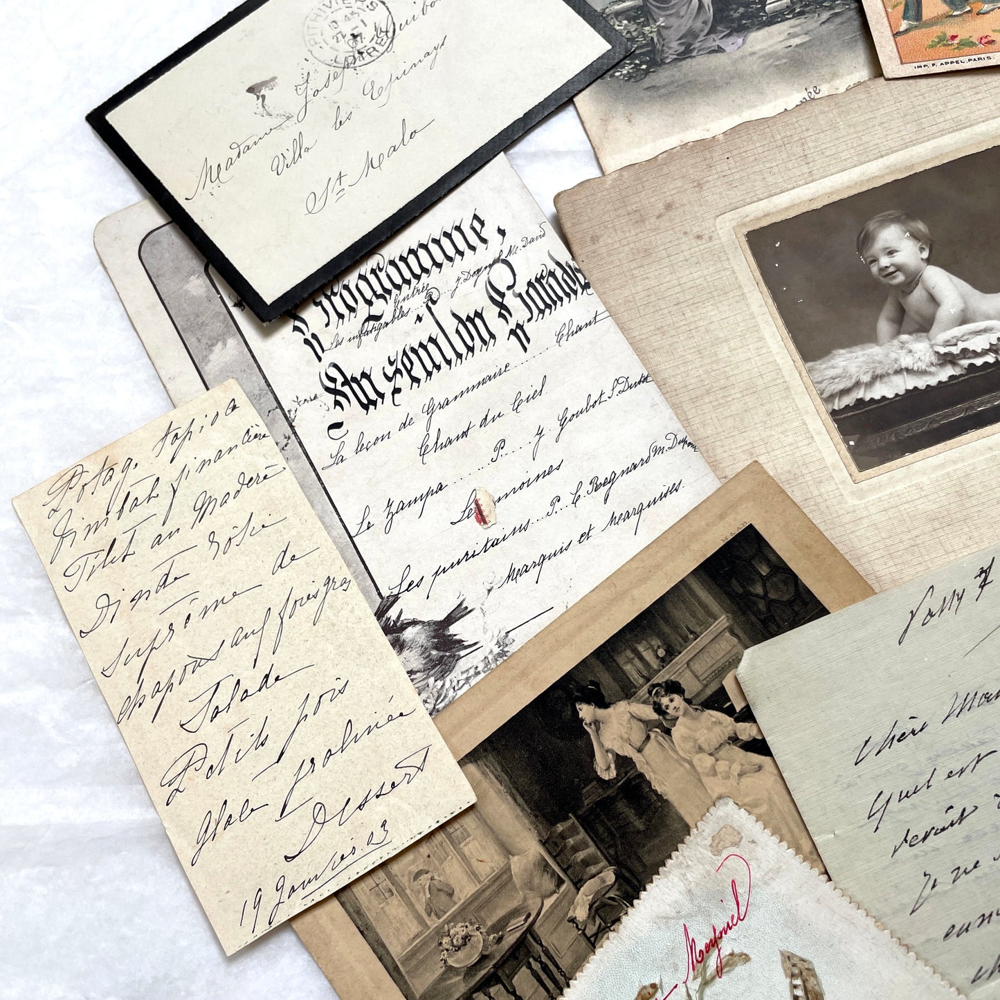 1910s Vintage French Ephemera Lot featuring handwritten letters, postcards, baby photo, and old documents.