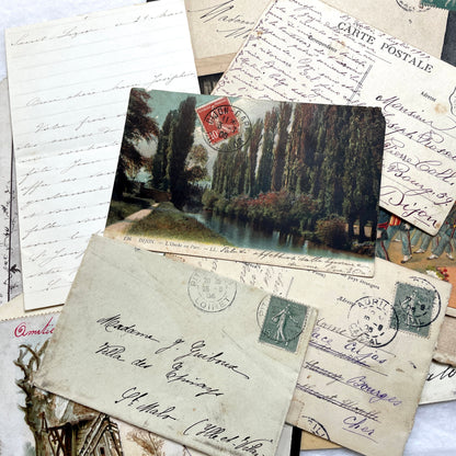 1910s Vintage French Ephemera Lot featuring handwritten letters, postcards, baby photo, and old documents.