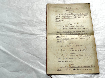 Late 19th handwritten French play script manuscript on aged paper with elegant penmanship, revealing literary text.