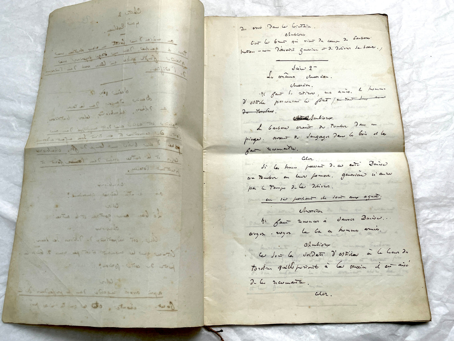 Late 19th handwritten French play script manuscript on aged paper with elegant penmanship, revealing literary text.