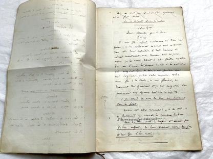 Late 19th handwritten French play script manuscript on aged paper with elegant penmanship, revealing literary text.