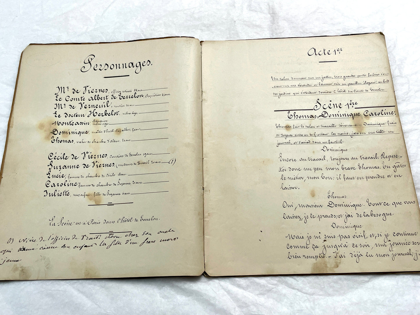 Late 19th French handwritten play manuscript with 'Scène 5' and 'Personnages' list visible.