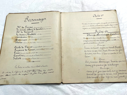 Late 19th French handwritten play manuscript with 'Scène 5' and 'Personnages' list visible.