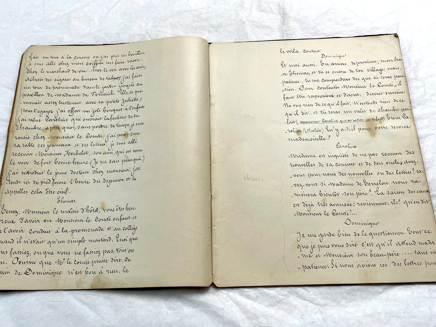Late 19th French handwritten play manuscript with 'Scène 5' and 'Personnages' list visible.