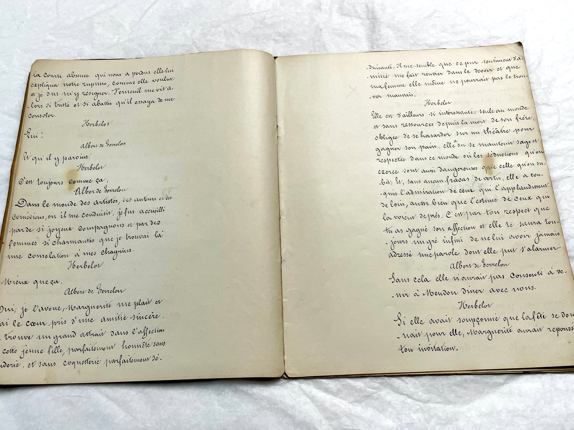 Late 19th French handwritten play manuscript with 'Scène 5' and 'Personnages' list visible.