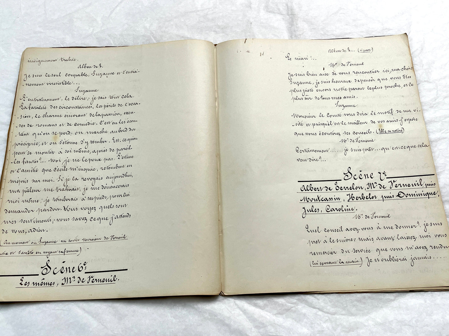 Late 19th French handwritten play manuscript with 'Scène 5' and 'Personnages' list visible.