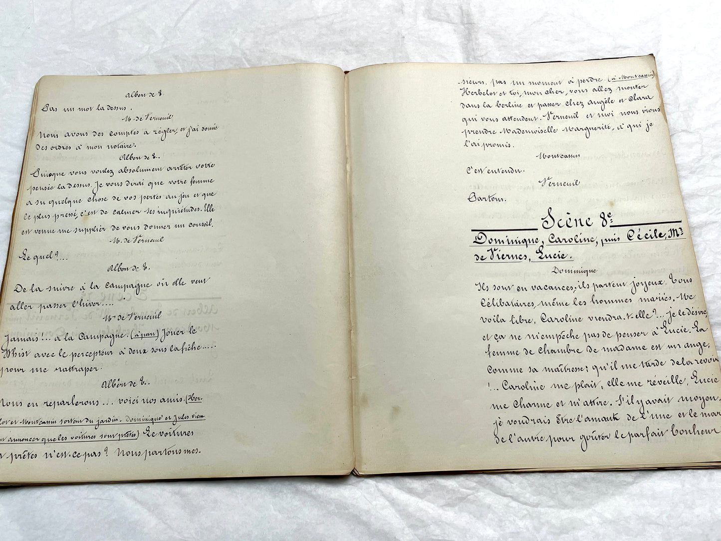 Late 19th French handwritten play manuscript with 'Scène 5' and 'Personnages' list visible.