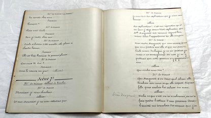1930s French play script manuscript showing 'Acte 5ème' and handwritten text for a theater scene.