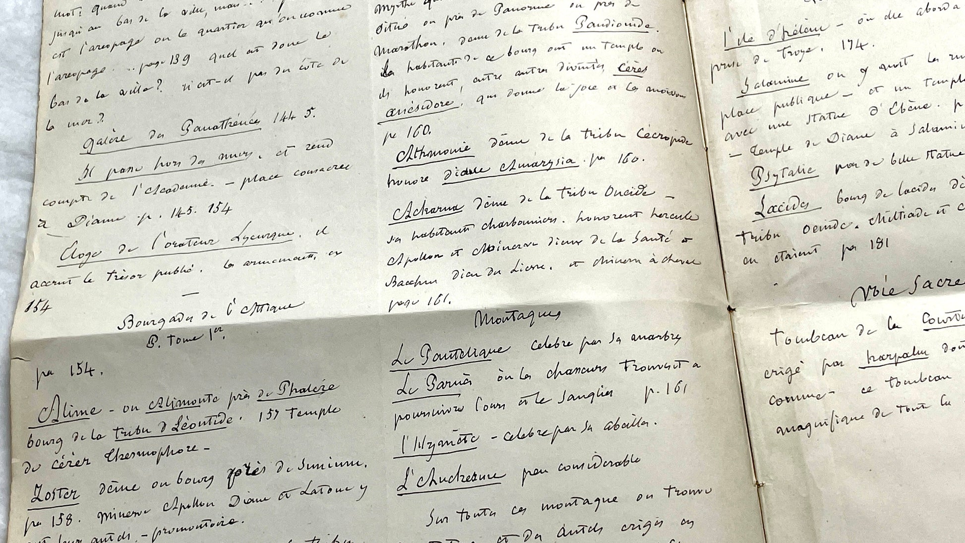 1900s French handwritten manuscript pages detailing ancient Greece history and mythology with elegant script.
