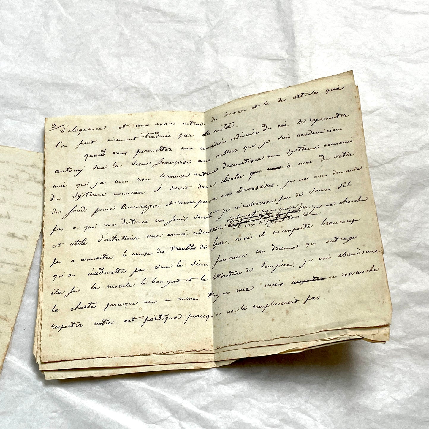 Late 19th French manuscript pages with elegant handwritten script detailing a historical political discourse.