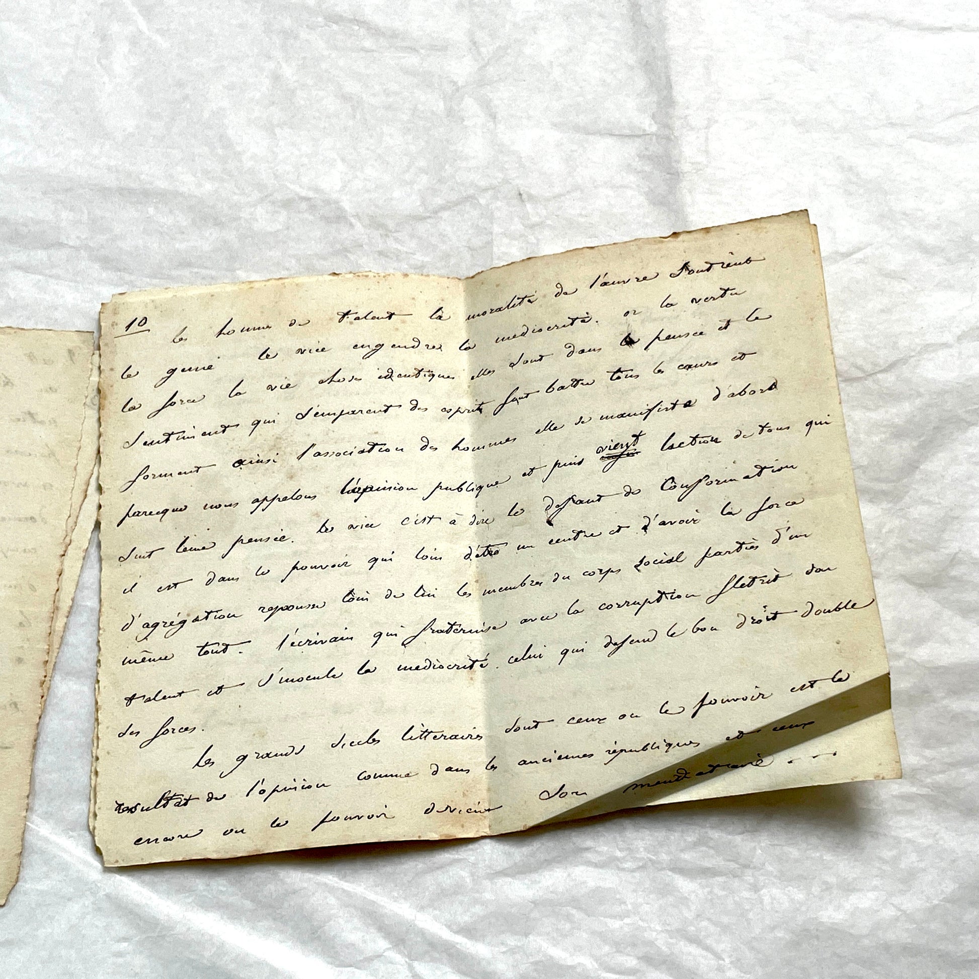 Late 19th French manuscript pages with elegant handwritten script detailing a historical political discourse.