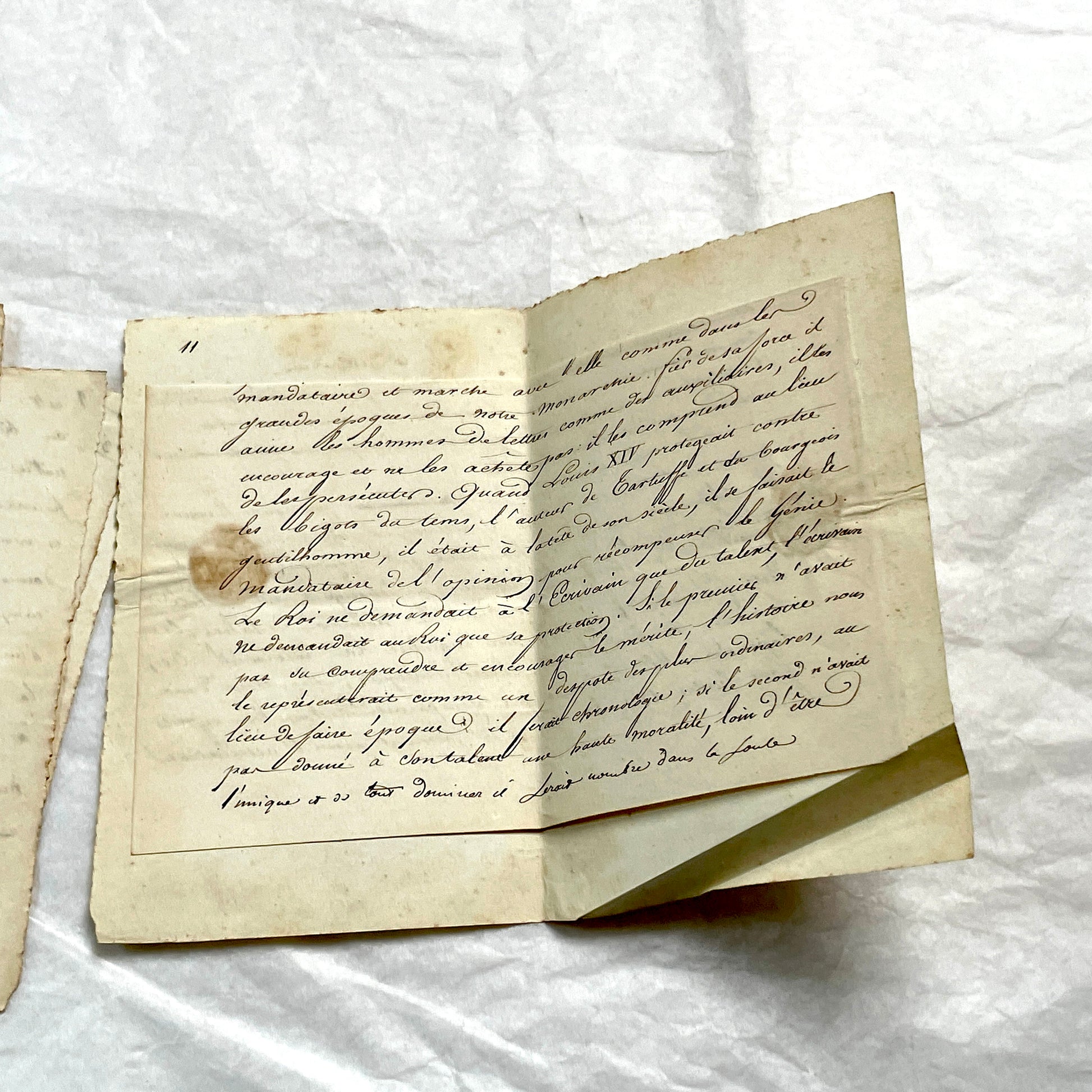 Late 19th French manuscript pages with elegant handwritten script detailing a historical political discourse.