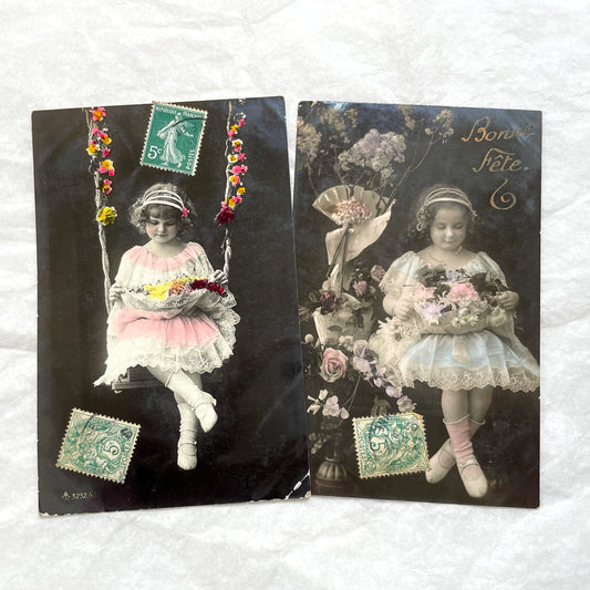 1900s French postcards lot featuring two sweet little girls with flowers, hand-colored details, and vintage stamps.