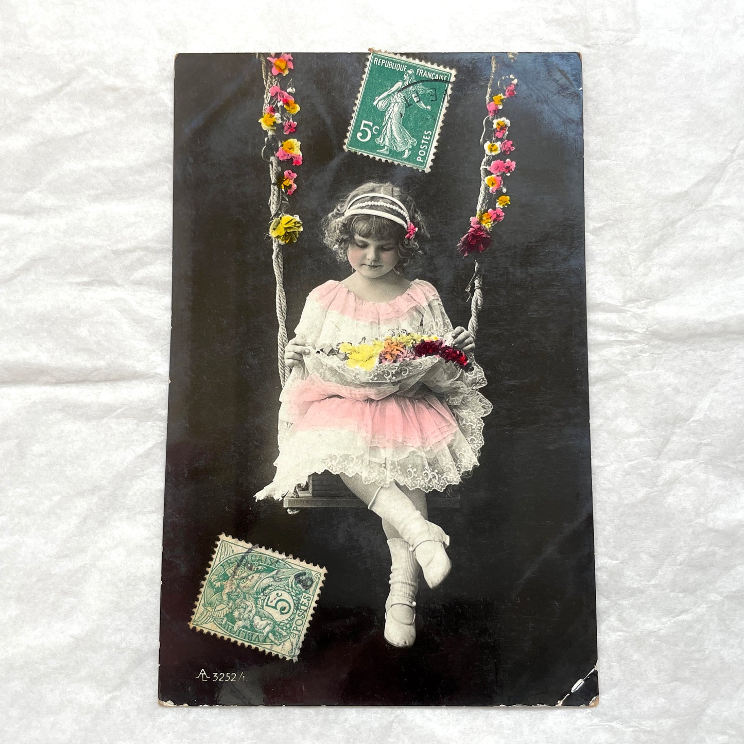 1900s French postcards lot featuring two sweet little girls with flowers, hand-colored details, and vintage stamps.