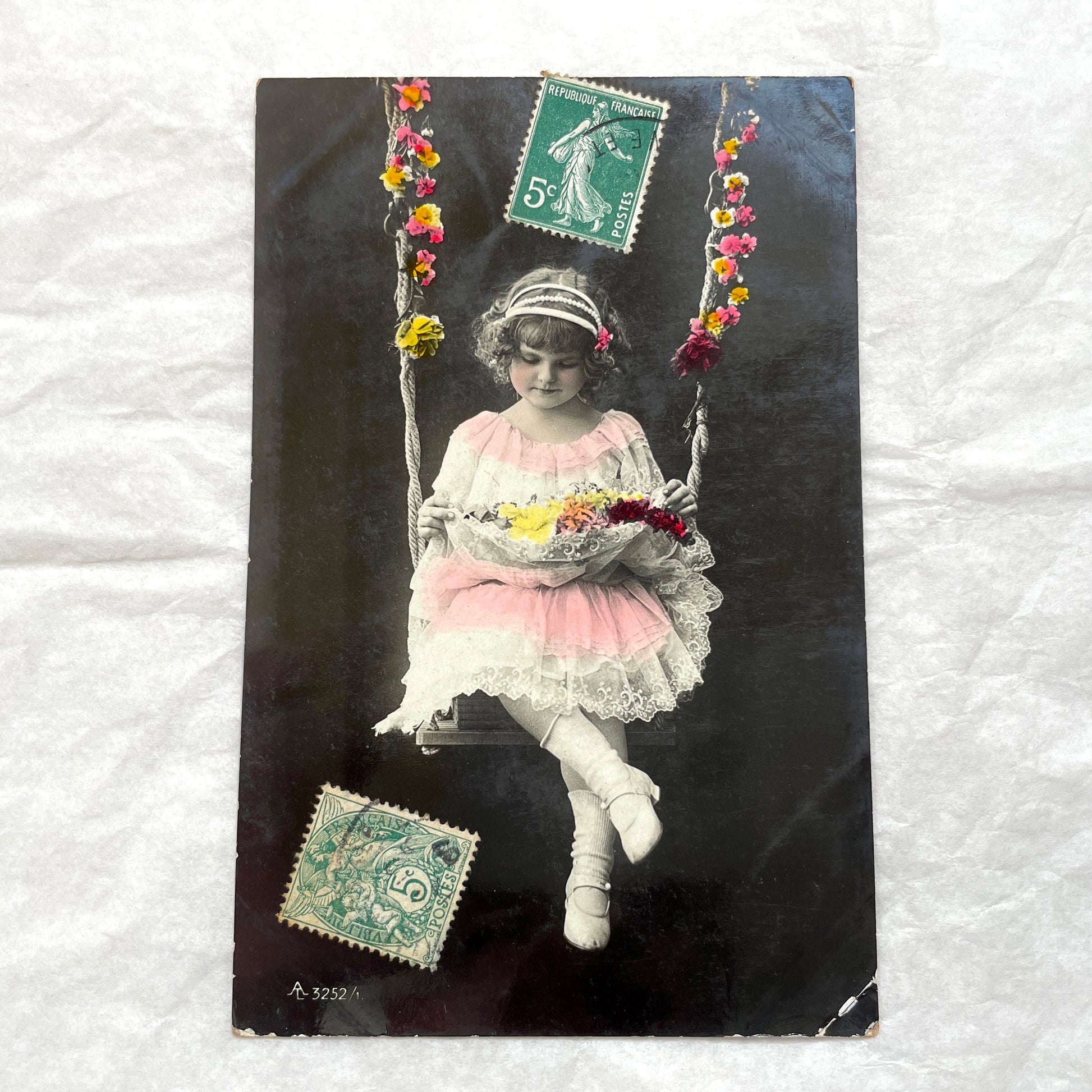 1900s French postcards lot featuring two sweet little girls with flowers, hand-colored details, and vintage stamps.