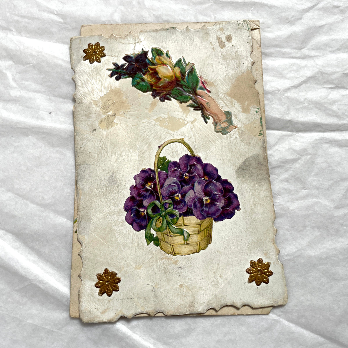1900s lot of three antique French postcards featuring children, daisies, pansies, and lily of the valley.