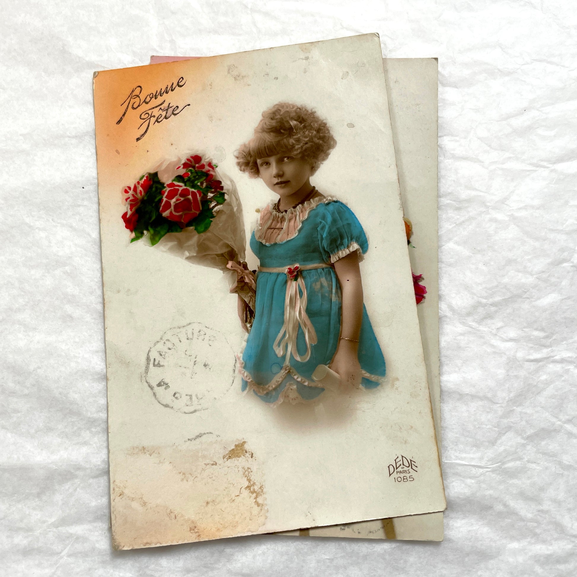 1910s French postcards lot featuring vintage children and floral designs with 'Bonne Fête' and 'Bonne Année' greetings.