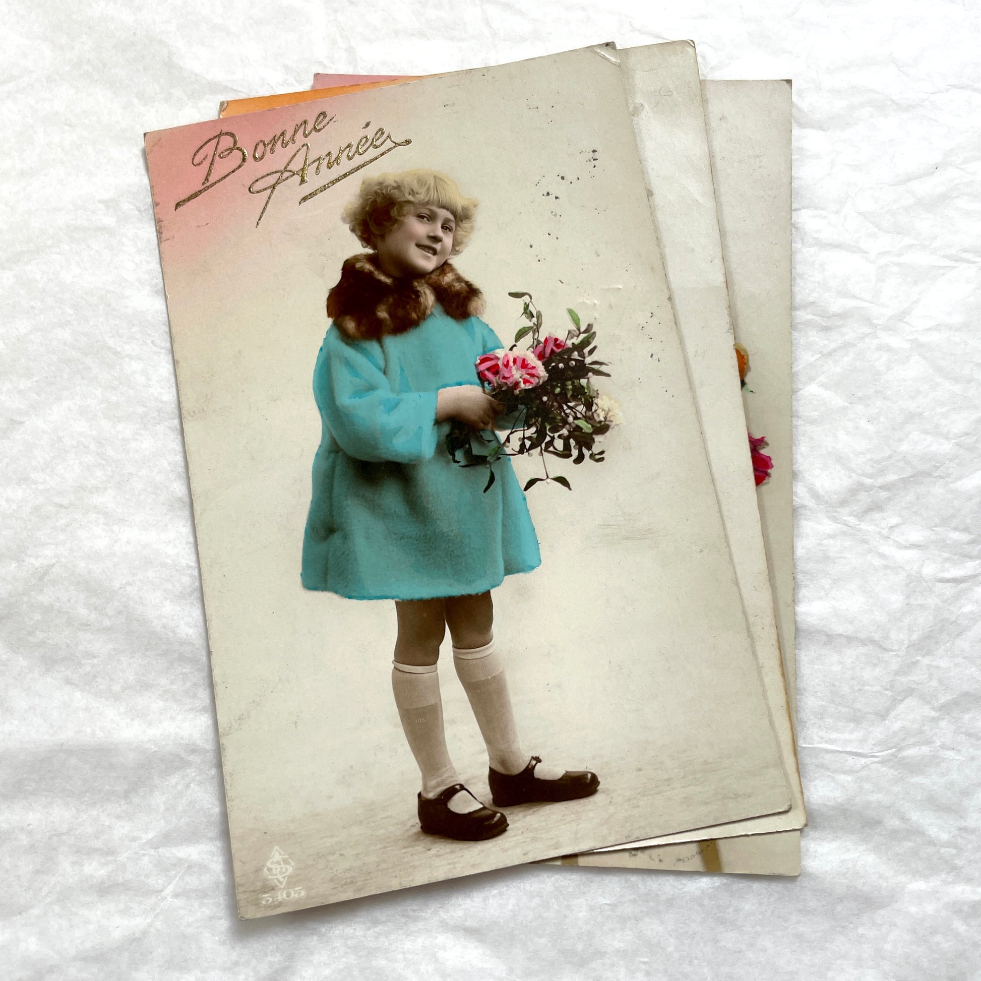 1910s French postcards lot featuring vintage children and floral designs with 'Bonne Fête' and 'Bonne Année' greetings.