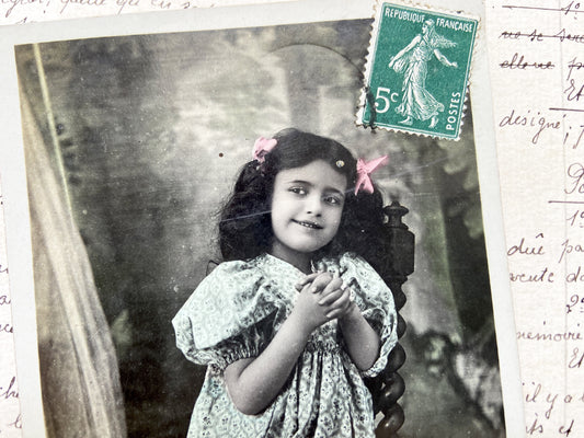 1910s - Vintage French Postcard - Charming Young Girl Portrait - Hand-Colored Dress And Hair Ribbons - Studio Photo - Collectible Ephemera