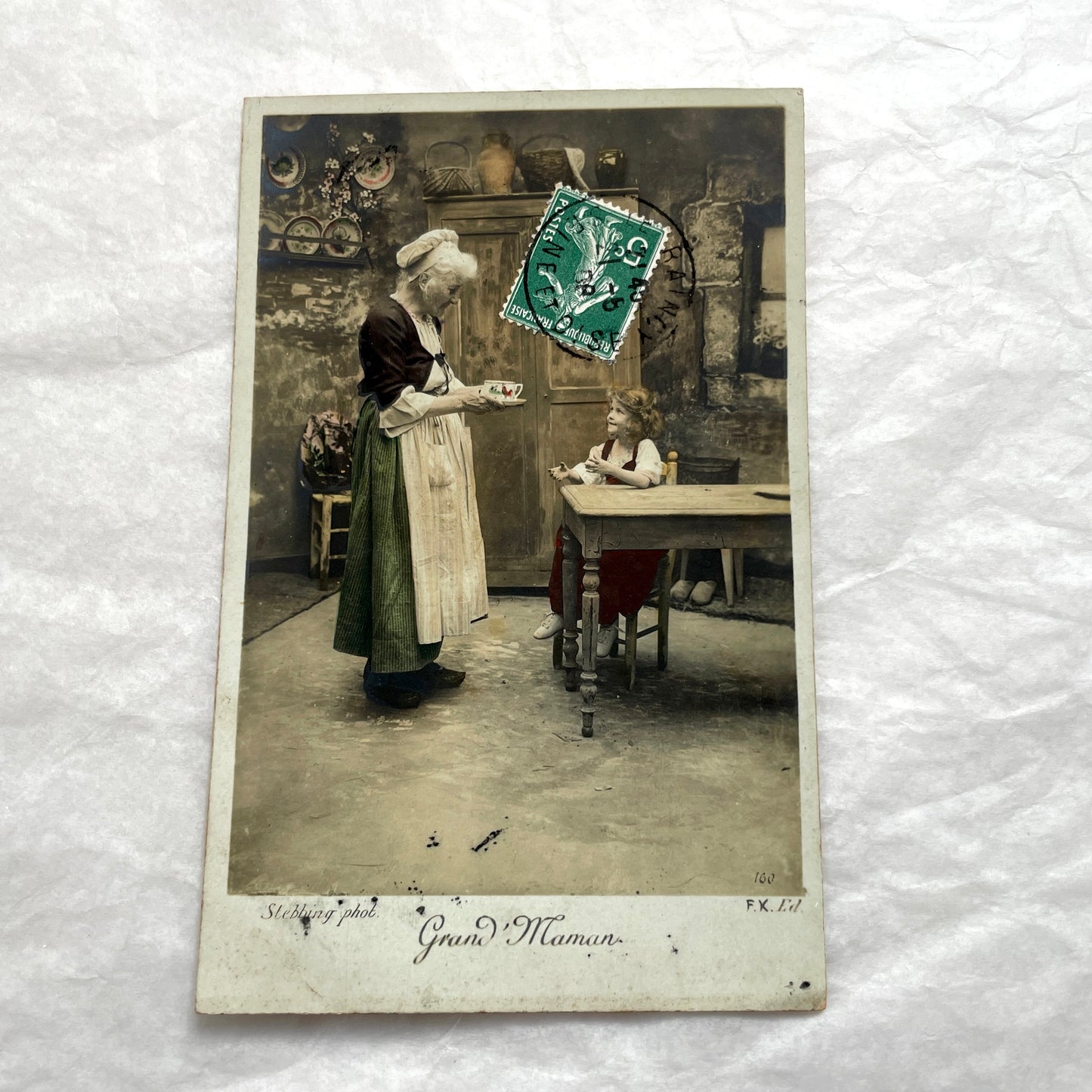 1910s French postcard lot of 5, featuring sepia-toned photos of a grandmother and granddaughter in daily scenes.