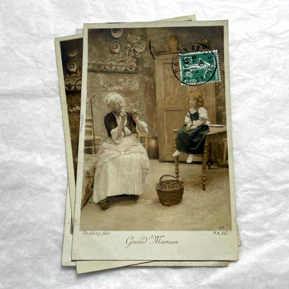 1910s French postcard lot of 5, featuring sepia-toned photos of a grandmother and granddaughter in daily scenes.
