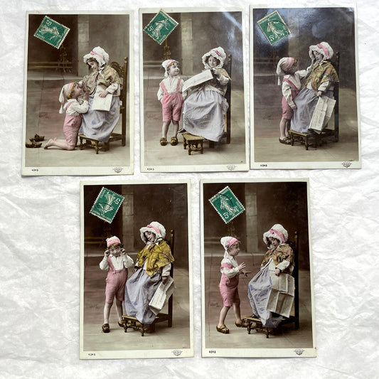 1900s French Postcards Lot - Hand-colored images of children with bonnets and newspaper by Walery Paris.