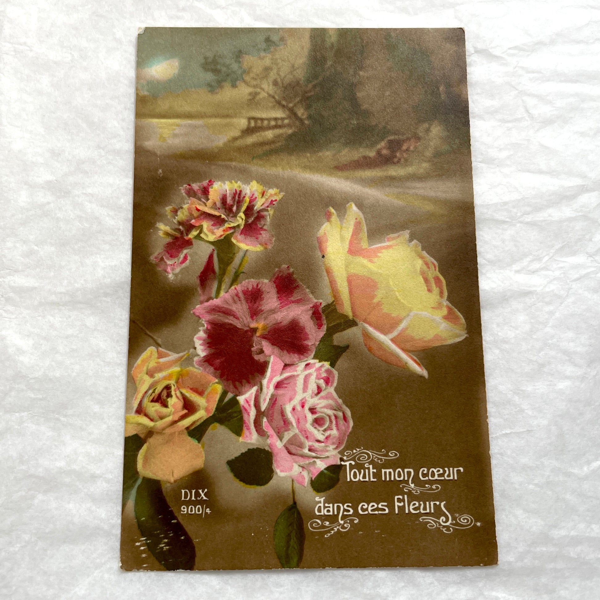 Lot of 1900s French postcards with vintage floral illustrations and romantic French messages.