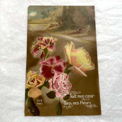 Lot of 1900s French postcards with vintage floral illustrations and romantic French messages.