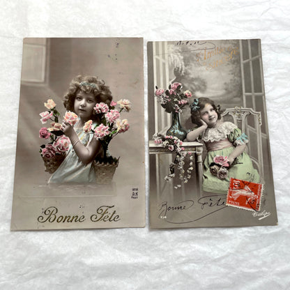 Two French postcards from the 1910s depicting young girls with flowers and 'Bonne Fete' greetings.